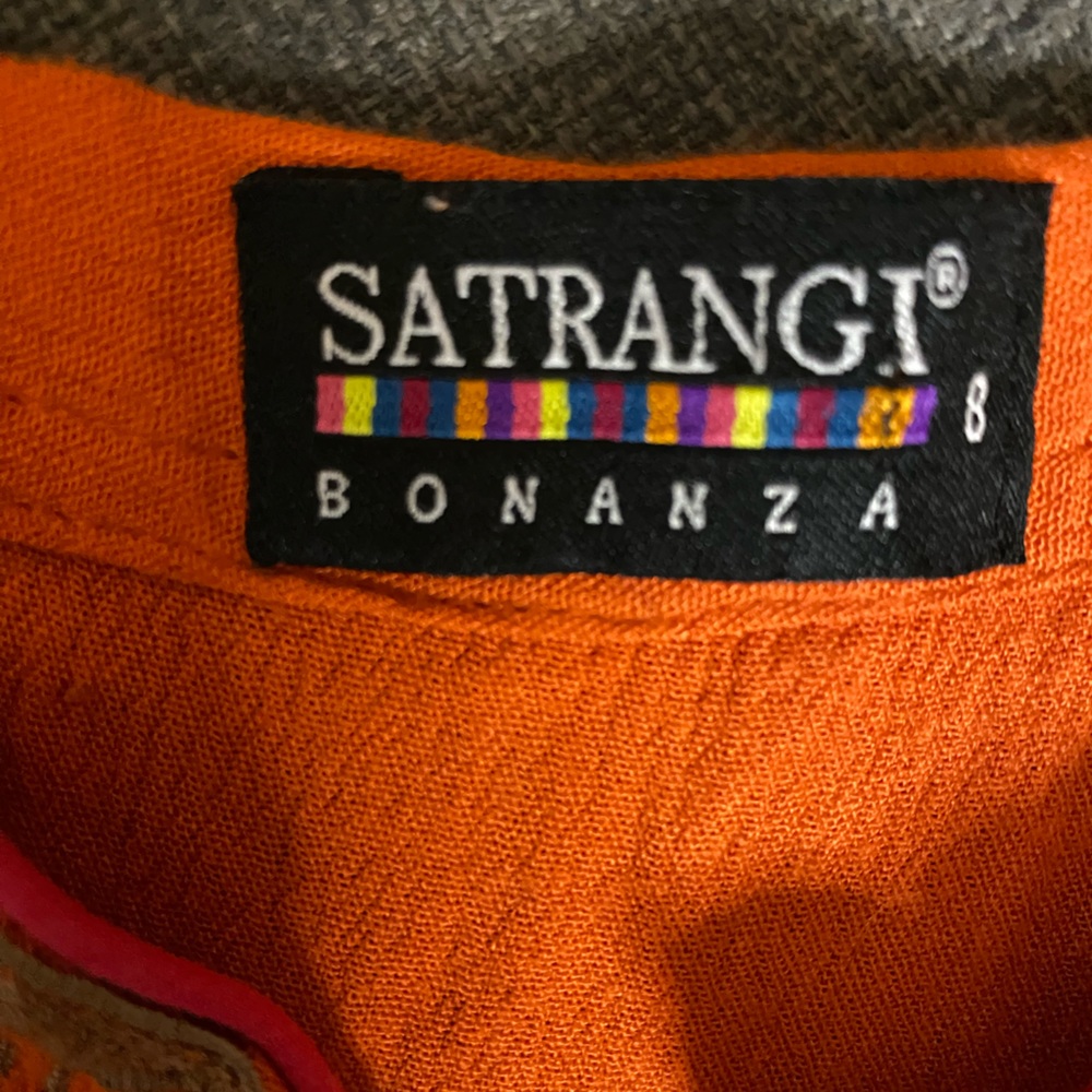 Orange, embroidered women’s top from India, small, maybe XS.
